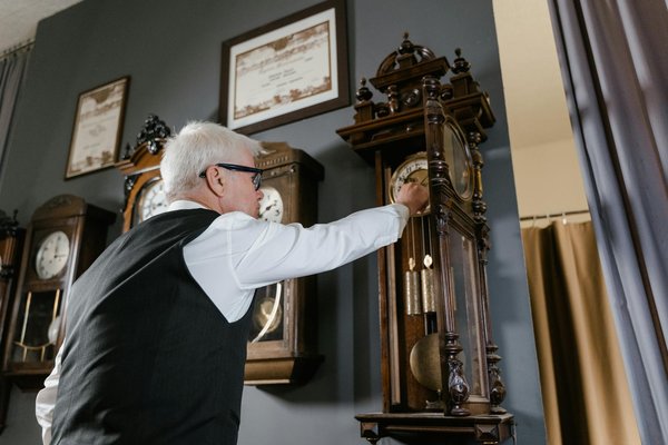 How can you ensure the safe transport of a collection of antique clocks during a UK move?
