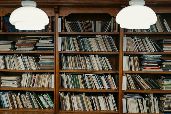 How can you effectively relocate a home with an extensive library of rare books?
